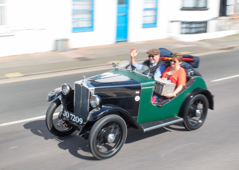 JO 7209 1933-Morris-Minor Nigel Buckner Photography Eastbourne May 2018 ws 1933 Morris minor during a parade of classic cars along the seafront at Eastbourne, Sussex, England.